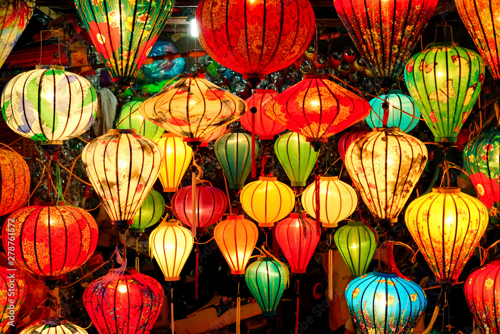 Many Colorful Vietnam lantern hanging on the wall at hoi an ancient old town is UNESCO World Heritage Sites in Hoi An , Vietnam