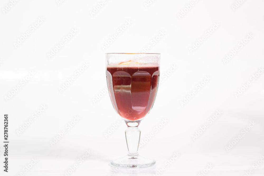 Tasty cherry grog cocktail on a white background Tasty cherry grog cocktail on a white background