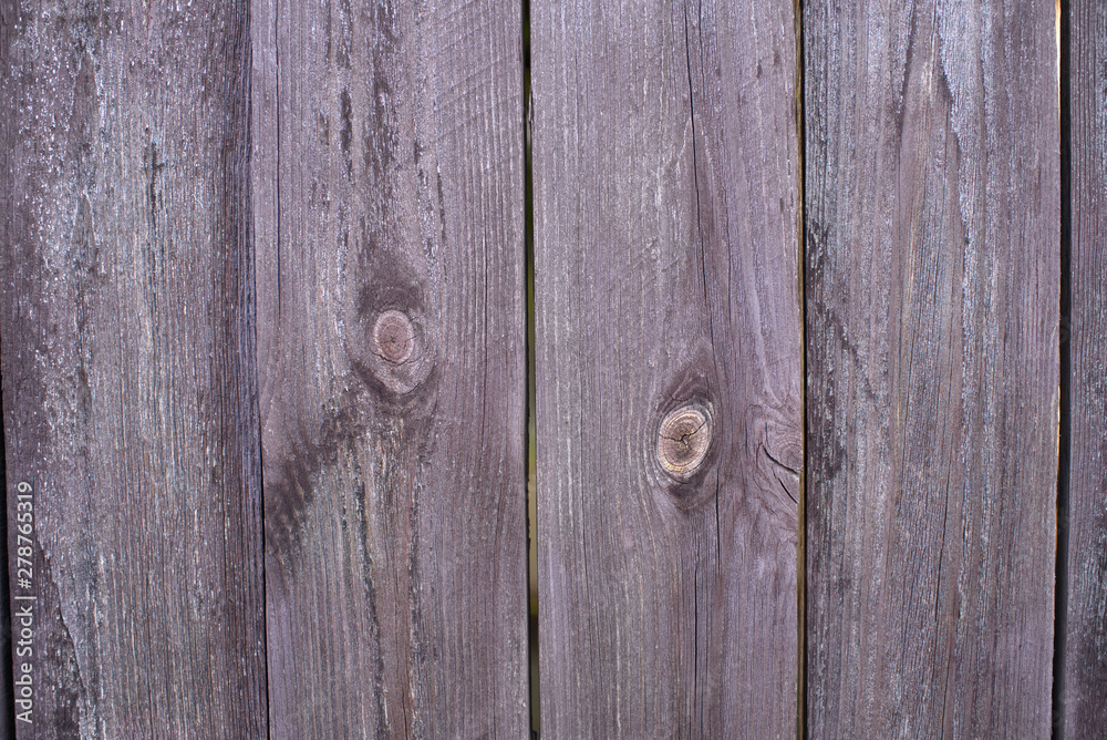 Obraz premium Old wooden fence with peeling paint