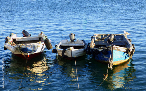 rowing boats bobbing in the water