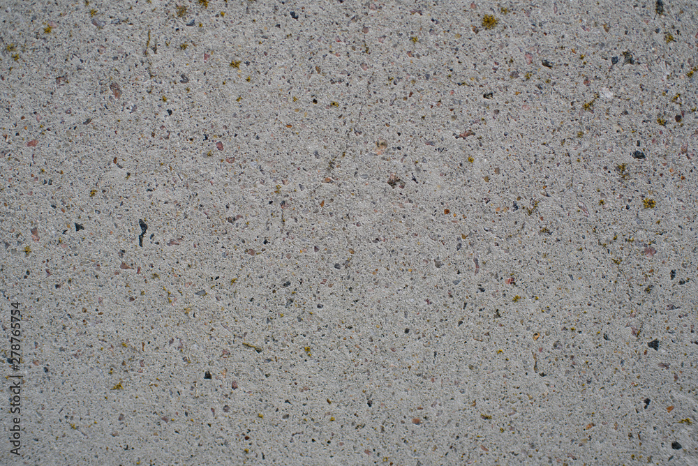 Detail of a gray wall close up. Cinderblock garage, detailing the outside of the garage wall Detail of a gray wall close up. Cinderblock garage, detailing the outside of the garage wall