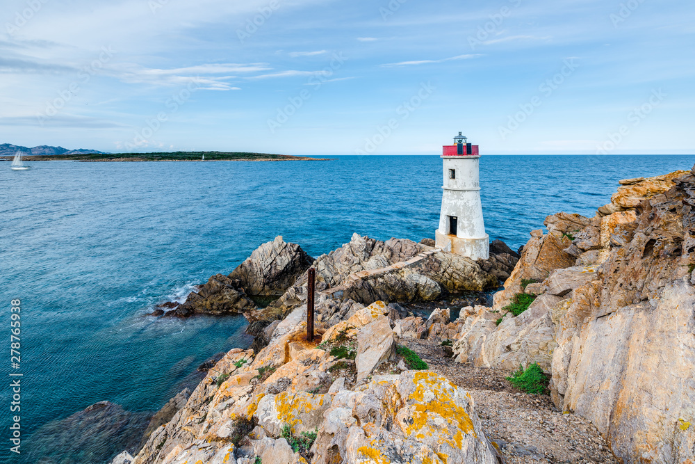 Foto de Capo Ferro lighthouse in Sardinia, Italy. do Stock | Adobe Stock
