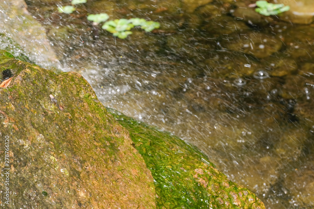 Fragment of a small decorative artificial waterfall Fragment of a small decorative artificial waterfall