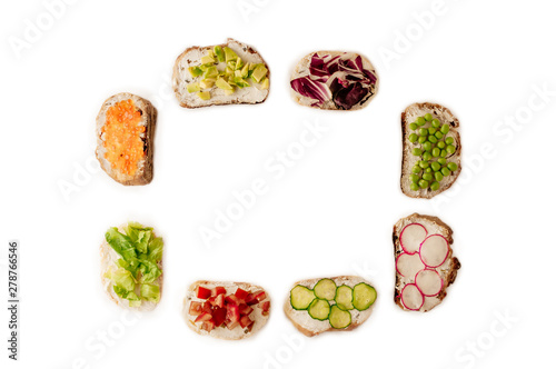 Mini sandwich set with french baguette, cheese, fish and avocado on white background top view mock up.Copy space for your text