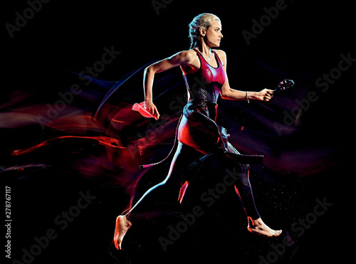 one caucasian woman triathlon triathlete studio shot isolated on black background with light painting effect