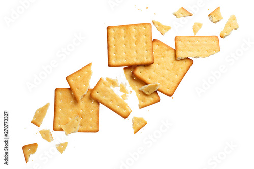 Quadro su tela Crushed dry crackers, isolated on white background