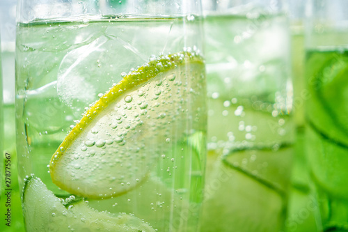Detail of cucumber and lemon sparkling cocktail.