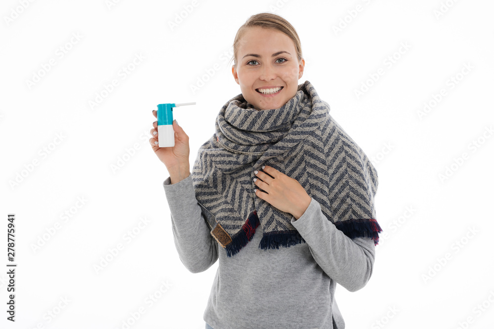 Young sick woman wrapped in a scarf on white background. Cold, flu, illness. Young sick woman wrapped in a scarf on white background. Cold, flu, illness.