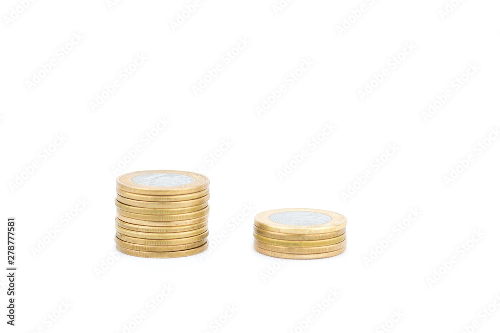 Close-up Brazilian currency money, white background. Coins of savings. Brazil. Selective focus. Growing business and future concept, coins stack. Close-up Brazilian currency money, white background. Coins of savings. Brazil. Selective focus. Growing business and future concept, coins stack.