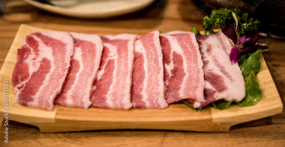 raw meat on a chopping board raw meat on a chopping board