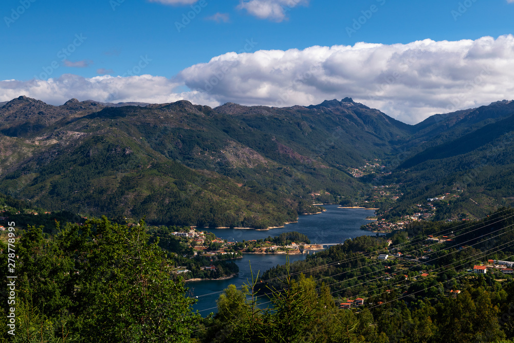 Scenic view of the lake at the Canicada Dam and the surrounding mountains at the Peneda Geres National Park, in Portugal, Europe.