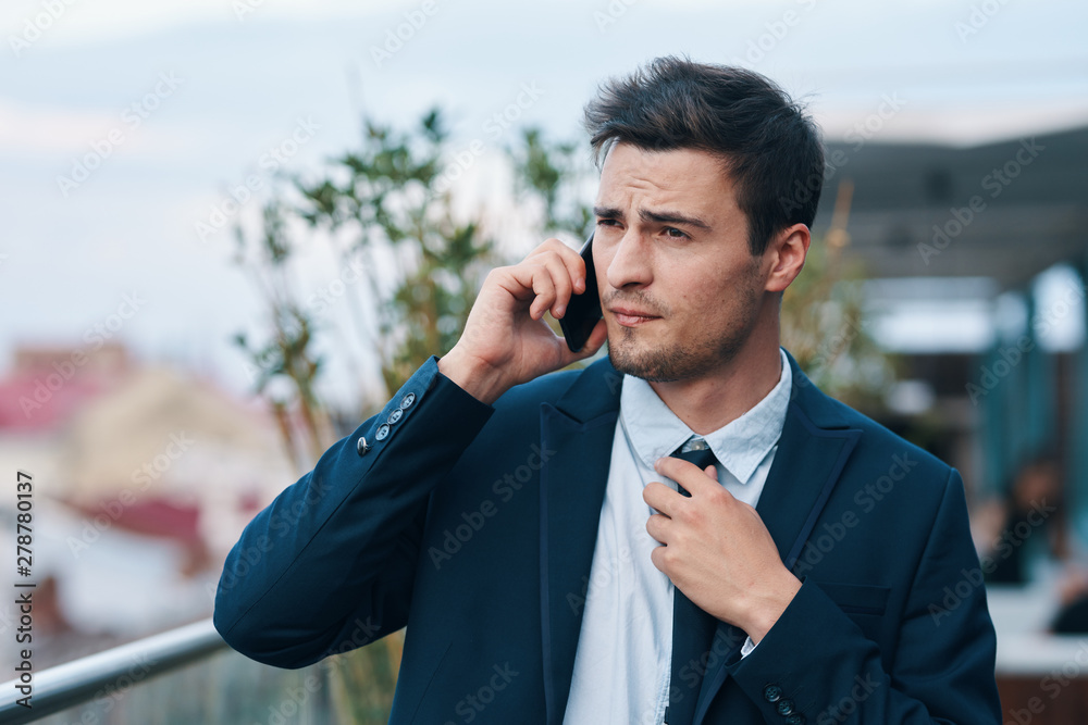 businessman talking on cell phone