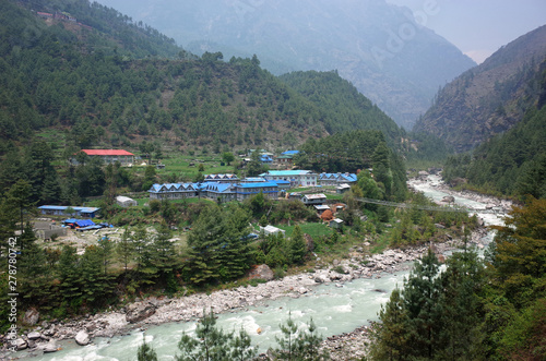 Phakding village and Dudh Koshi river in Khumbu valley on the way to Everest base camp, Solukhumbu, Nepal photo