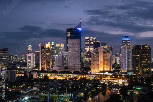 Night view of jakarta downtown district in Indonesia photo