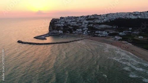 Aerial view of Peschici  sunrise, a country on the sea in Puglia in Italy