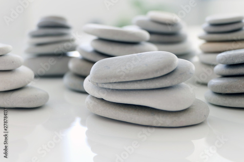 Canvas Print Round Gray Stones isolated on a White Background