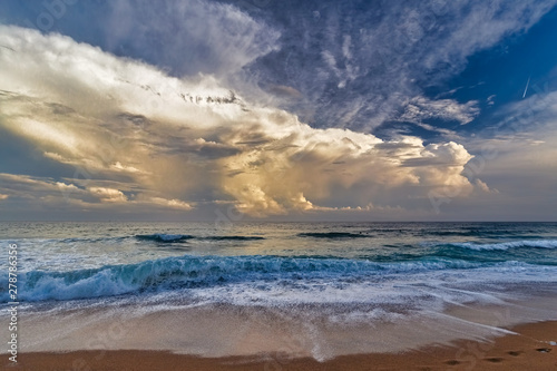 Fototapeta Naklejka Na Ścianę i Meble -  Beautiful cloudscape over the Spanish Costa Brava beach in Palamos