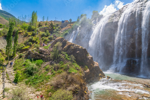 Tortum  Uzundere  waterfall from the side with people in Uzundere  Erzurum  Turkey
