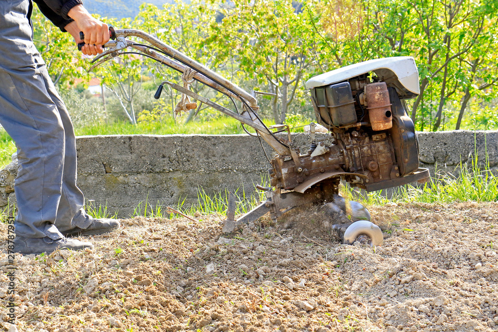 Fototapeta premium Plowing the earth