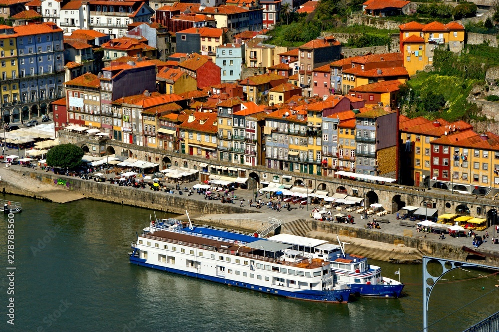 Panoramic view of Douro river and rooftops of Porto, Portugal