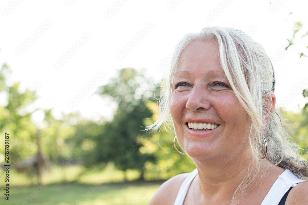 Smiling senior woman outdoor Smiling senior woman outdoor