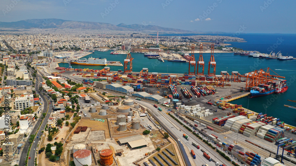 Aerial drone photo of industrial cargo area with cranes, container ships and logistics, Piraeus port, Drapetsona, Perama, Attica, Greece