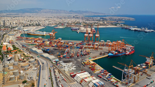 Aerial drone photo of industrial cargo area with cranes, container ships and logistics, Piraeus port, Drapetsona, Perama, Attica, Greece