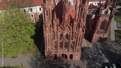 4k aerial view of gothic architecture heritage St. Anne's church in Vilnius, Lithuania photo
