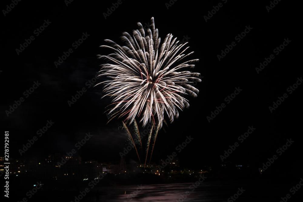 Firework celebrating Bastille Day in Biarritz city. Basque Country of France. Firework celebrating Bastille Day in Biarritz city. Basque Country of France.