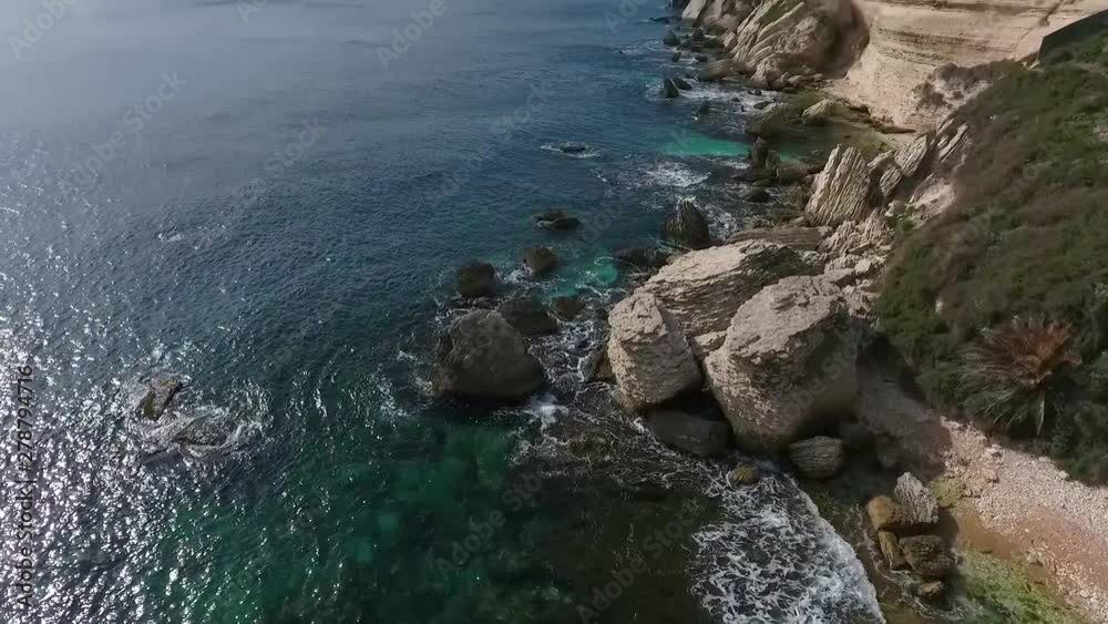 Aerial view of the rocky beach with pieces of rocks near the town of Bonifacio on the island of Corsica Aerial view of the rocky beach with pieces of rocks near the town of Bonifacio on the island of Corsica