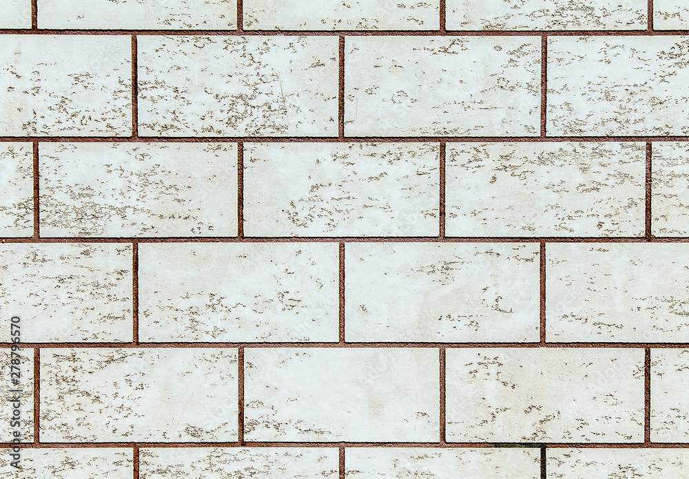 Fototapeta premium Wall of gray artificial stone as background