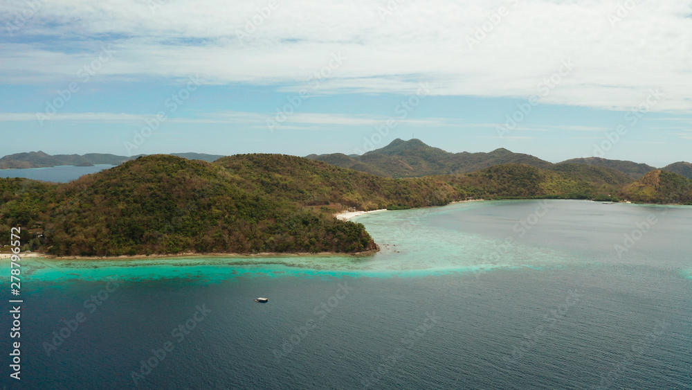 group tropical islands with white sand beach and blue clear water. aerial view seascape Philippines Palawan, Bulalacao
