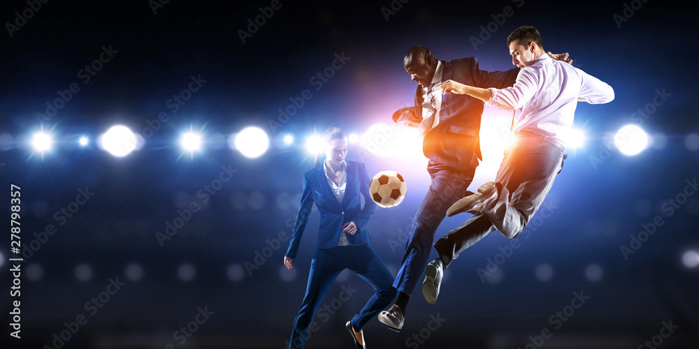 Naklejka premium Soccer man in action with ball. Mixed media
