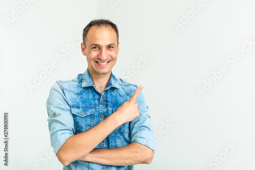 Handsome welcoming man smiling - isolated over a white background © Angelov