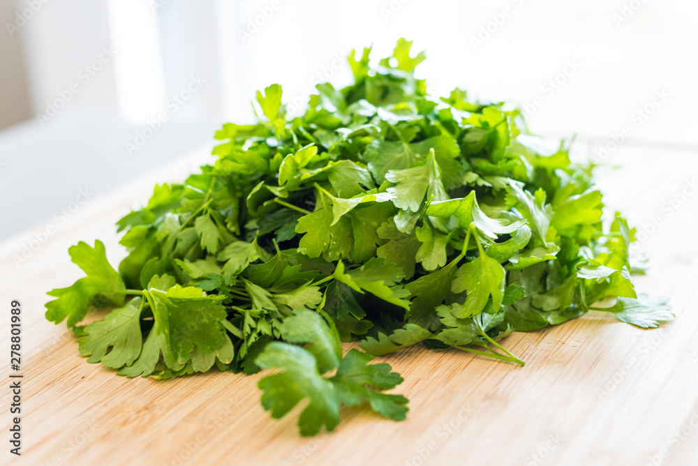 Parsley (Petroselinum crispum) as a herb in the kitchen Parsley (Petroselinum crispum) as a herb in the kitchen