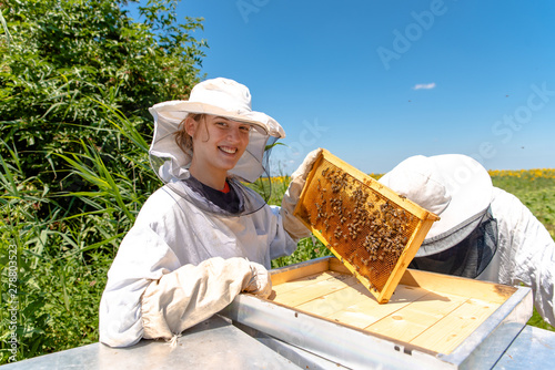 Young girl beekeeper