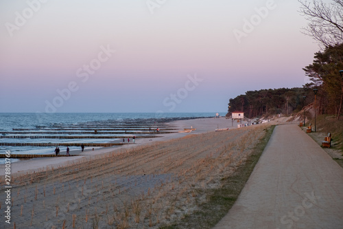 The beach of Zempin on the island of Usedom in the Baltic Sea at sunset.. photo