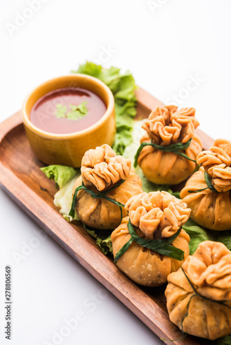 Crispy Potli Samosa or veg money bags are delicious Indian snacks of spiced aloo and mix veggies Or Meat/kheema stuffed in flaky dough. It's a great creative starter or appetiser. served with ketchup