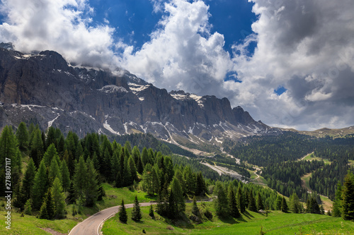 a mountain road in the dolomites