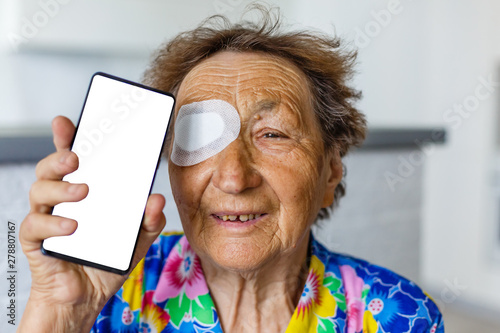 bandage on eye of a senior person