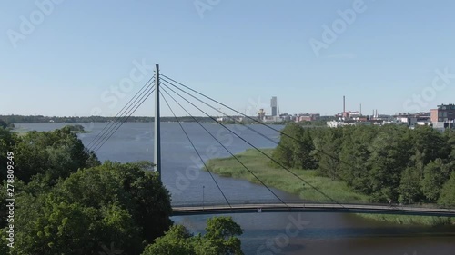 Flying over bridge. Bridge ropes. Helsinki. Finland. City view. photo