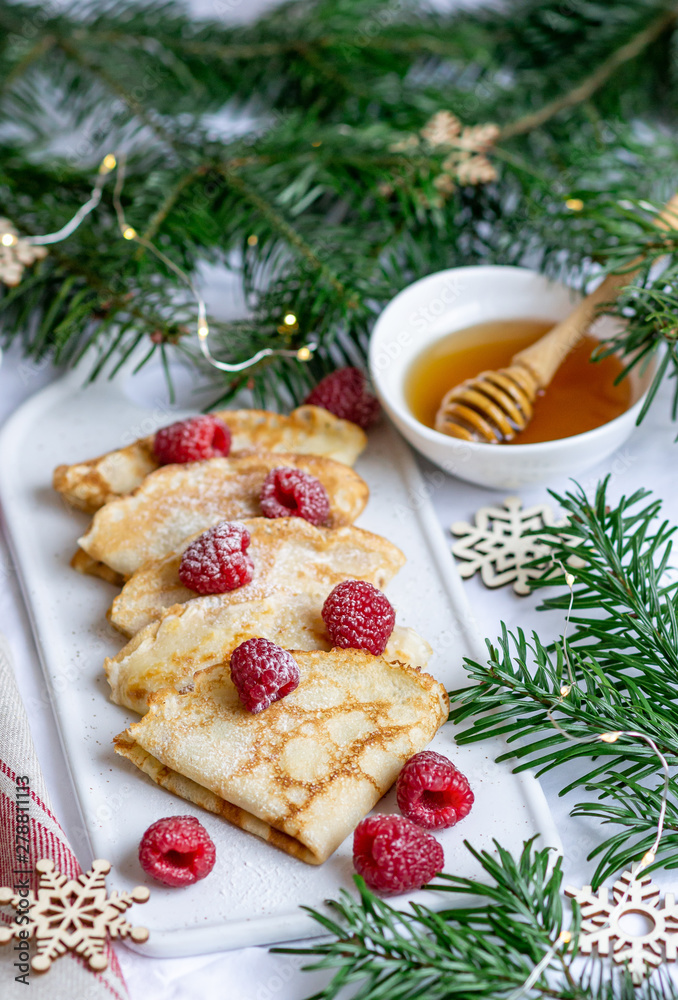 Homemade Pancakes with Raspberry and Honey, Christmas and New Year Decor, Easy Food Concept Breakfast Homemade Pancakes with Raspberry and Honey, Christmas and New Year Decor, Easy Food Concept Breakfast