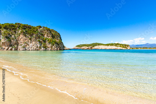 Voidokilia Beach, popular white sand and blue clear water beach in Messinia in Mediterranean area in shape of Greek letter omega, Peloponnese, Greece. © barmalini