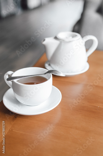 cup of tea at a cafe blurred background