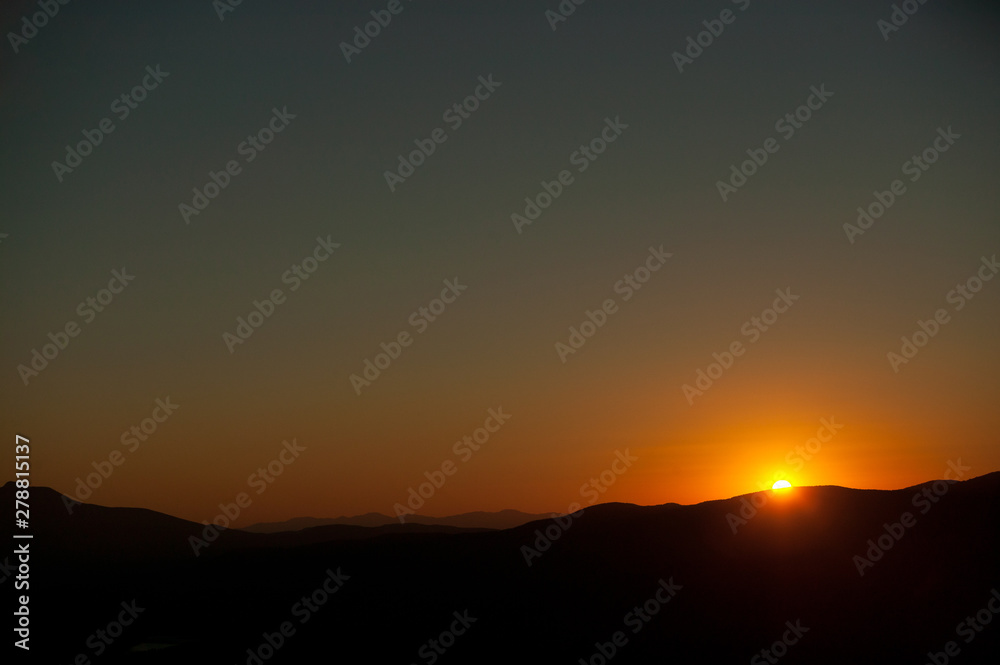 Sunset over mountain range, Stowe Vermont, USA