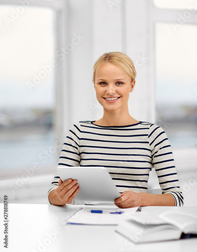 Free Download education, school and learning concept - student woman with tablet computer and book at home - GFXLoad