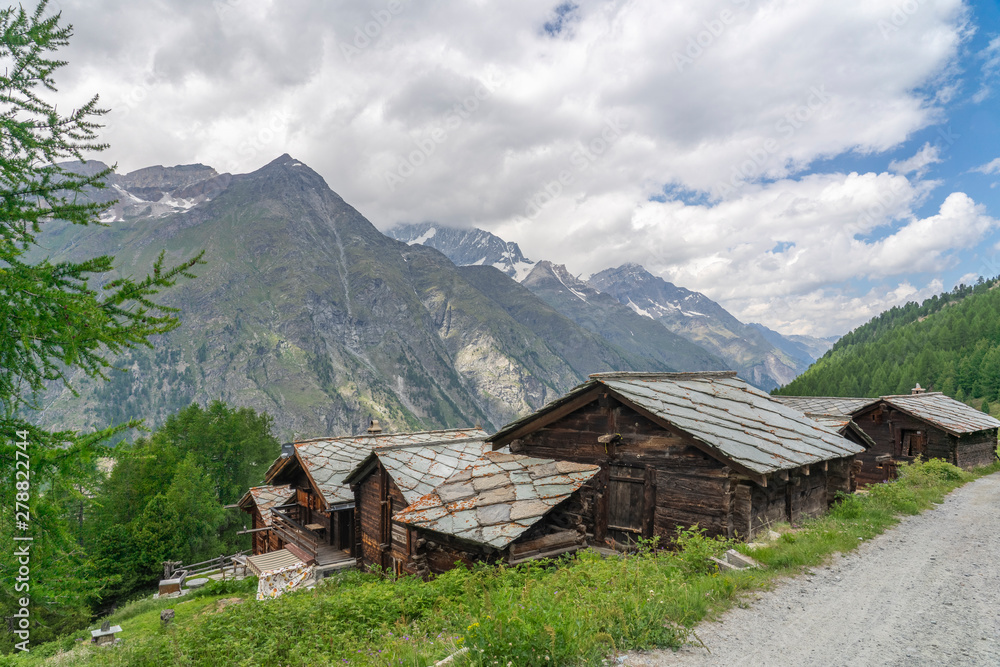 traditional wooden houses in the village of Tufteren, high above Zermatt, the famous touristic destination in the canton Valais, Wallis, Switzerland