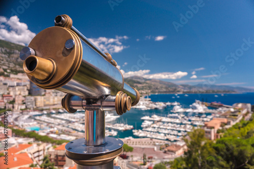 Telescope with a view of yachts in Monaco