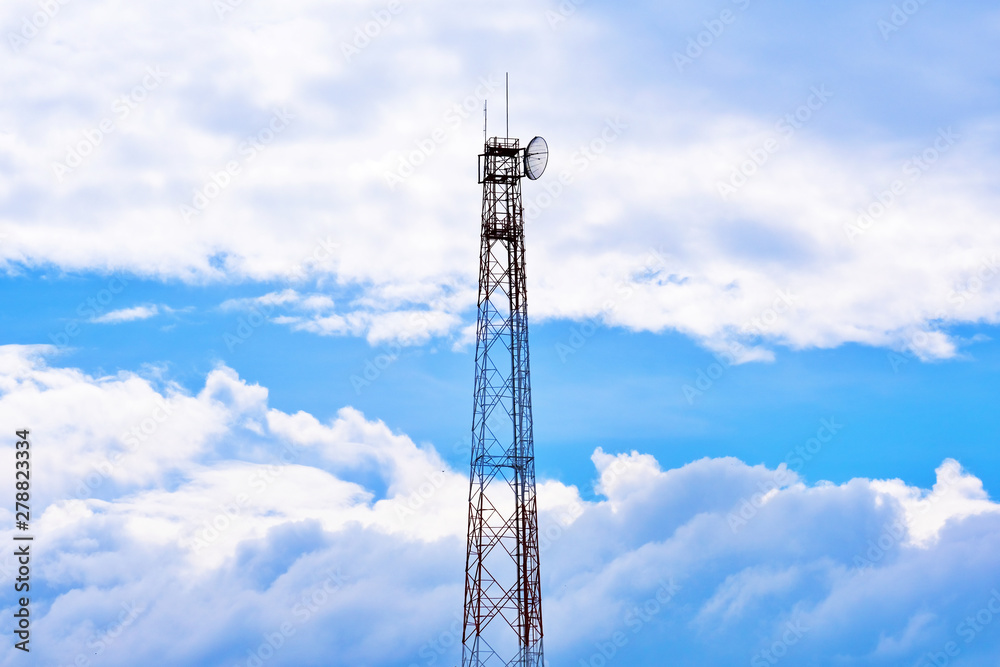 Telecommunications tower with cloudy sky Telecommunications tower with cloudy sky