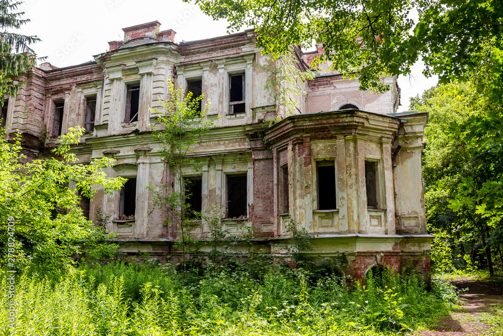 The ruins of the palace Yaroshenko late 19th century in the estate Stepanovskoe-Pavlishchevo, general view. Sanatorium Pavlishchev-Bor, Yuhnovskiy district, Kaluzhskiy region, Russia - July 2019